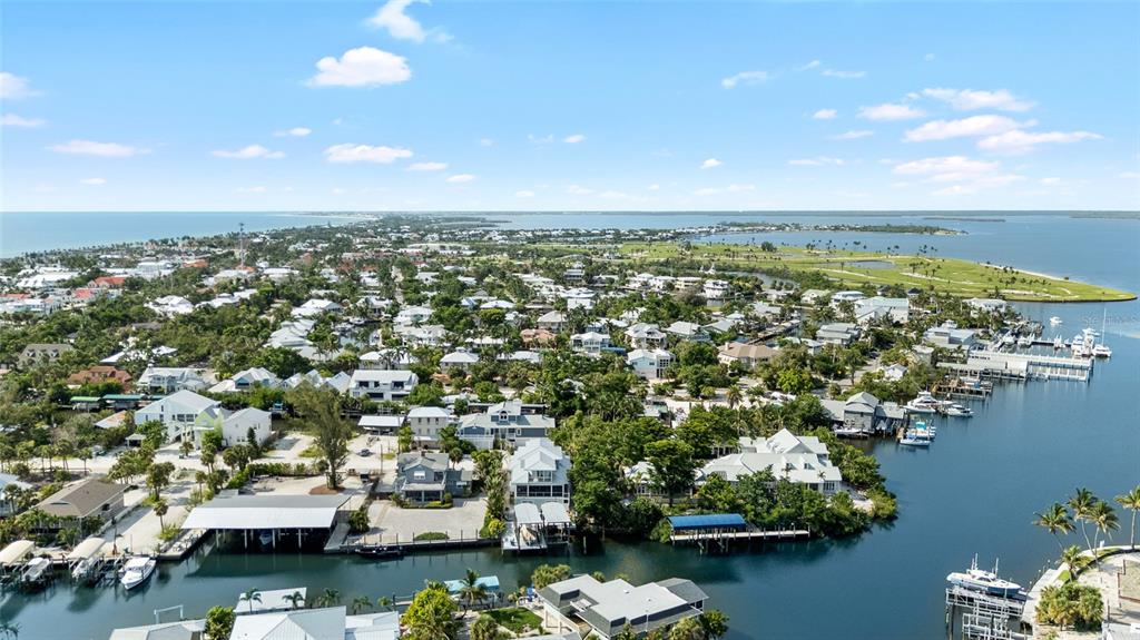180 Damfiwill Street Boca Grande, FL 33921 - Photo 75 of 83 an aerial view of residential house with outdoor space