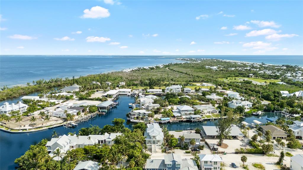 180 Damfiwill Street Boca Grande, FL 33921 - Photo 78 of 83 an aerial view of residential houses with outdoor space