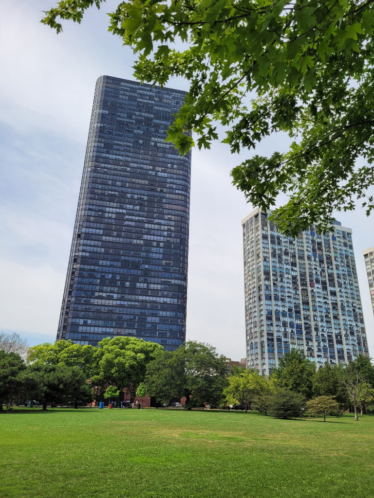a brick building with a yard