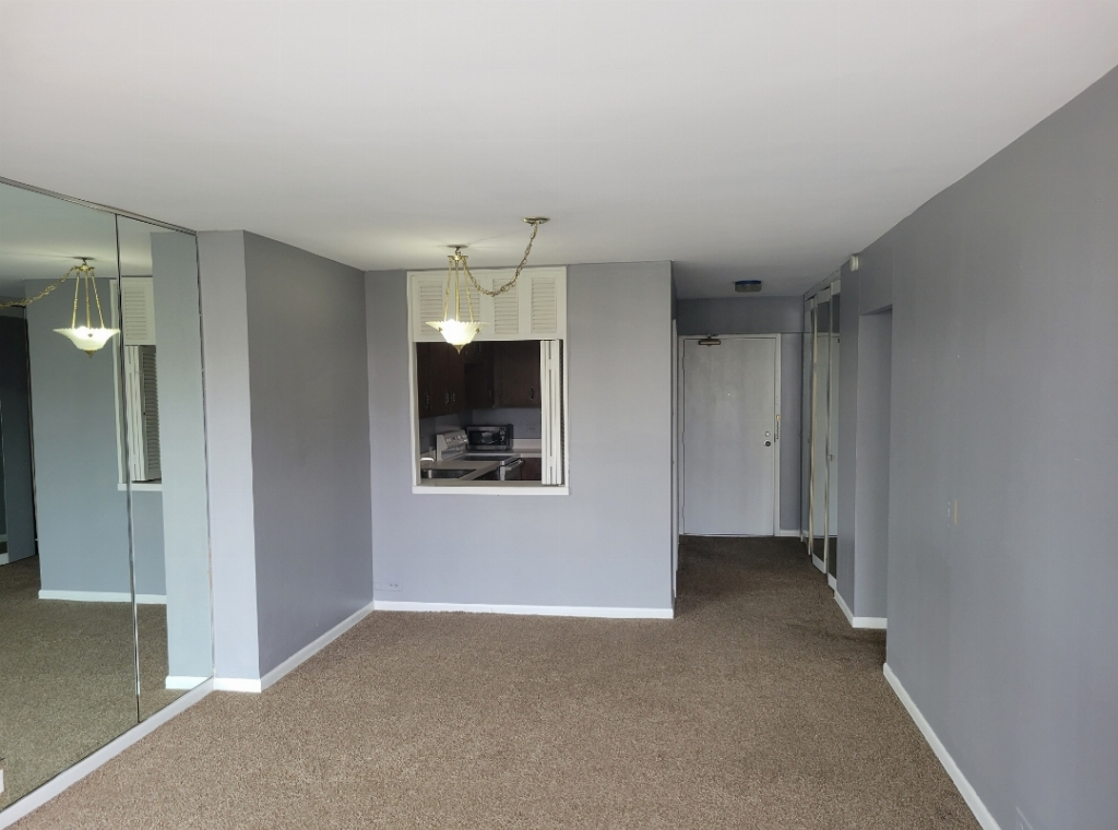 5415 North Sheridan Road, Unit 609 Chicago, IL 60640 - Photo 4 of 25 a view of a room with a natural light