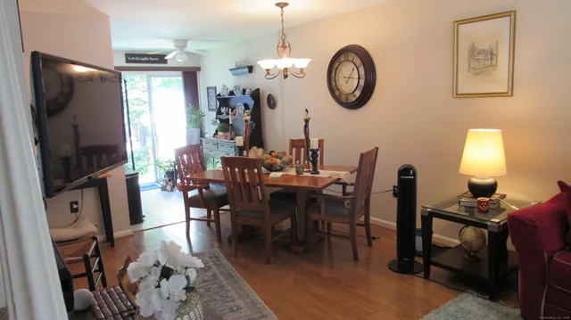 a view of a dining room with furniture