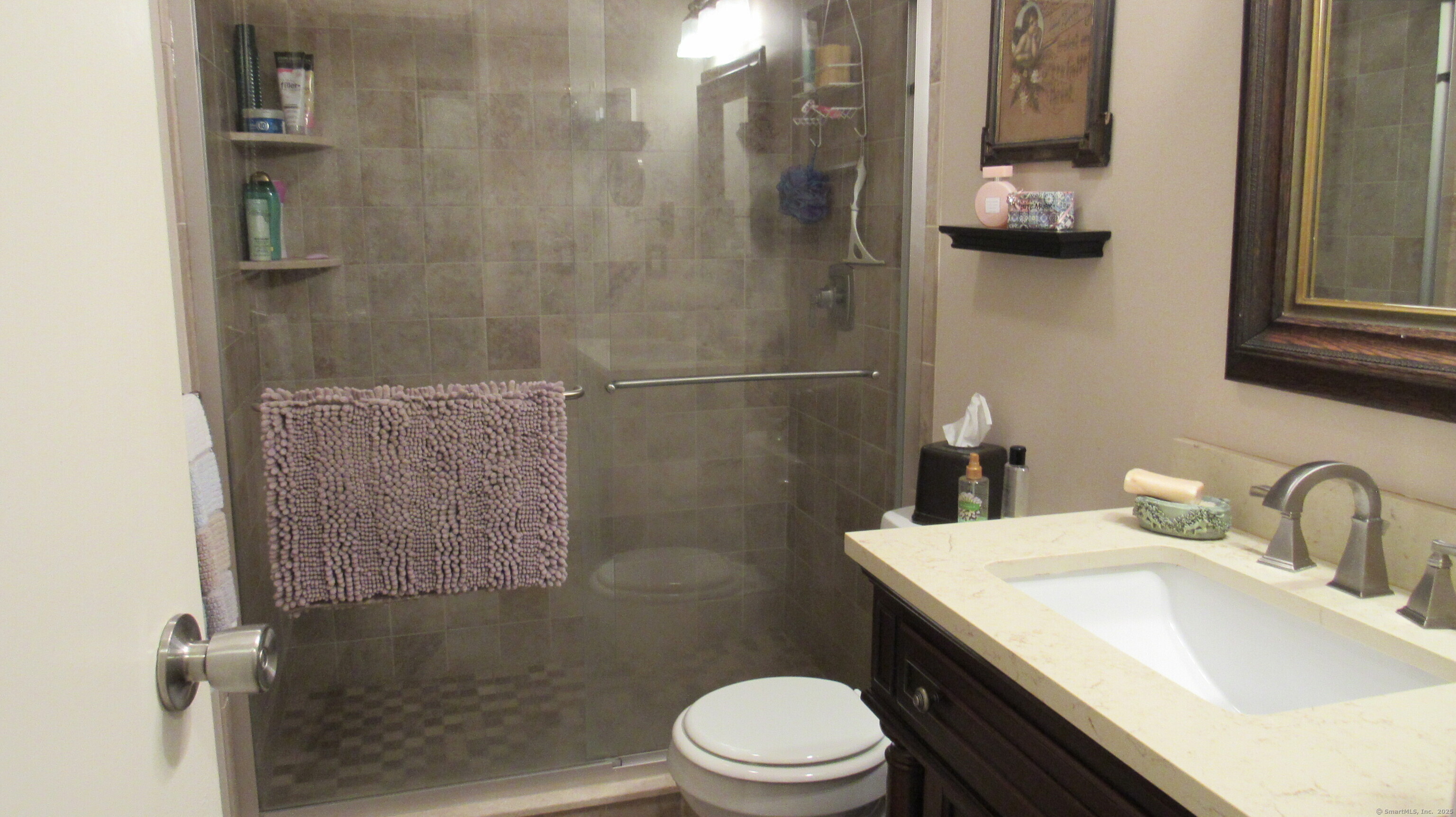 27 Surrey Lane, Unit 27 Torrington, CT 06790 - Photo 17 of 30 a bathroom with a sink toilet and shower