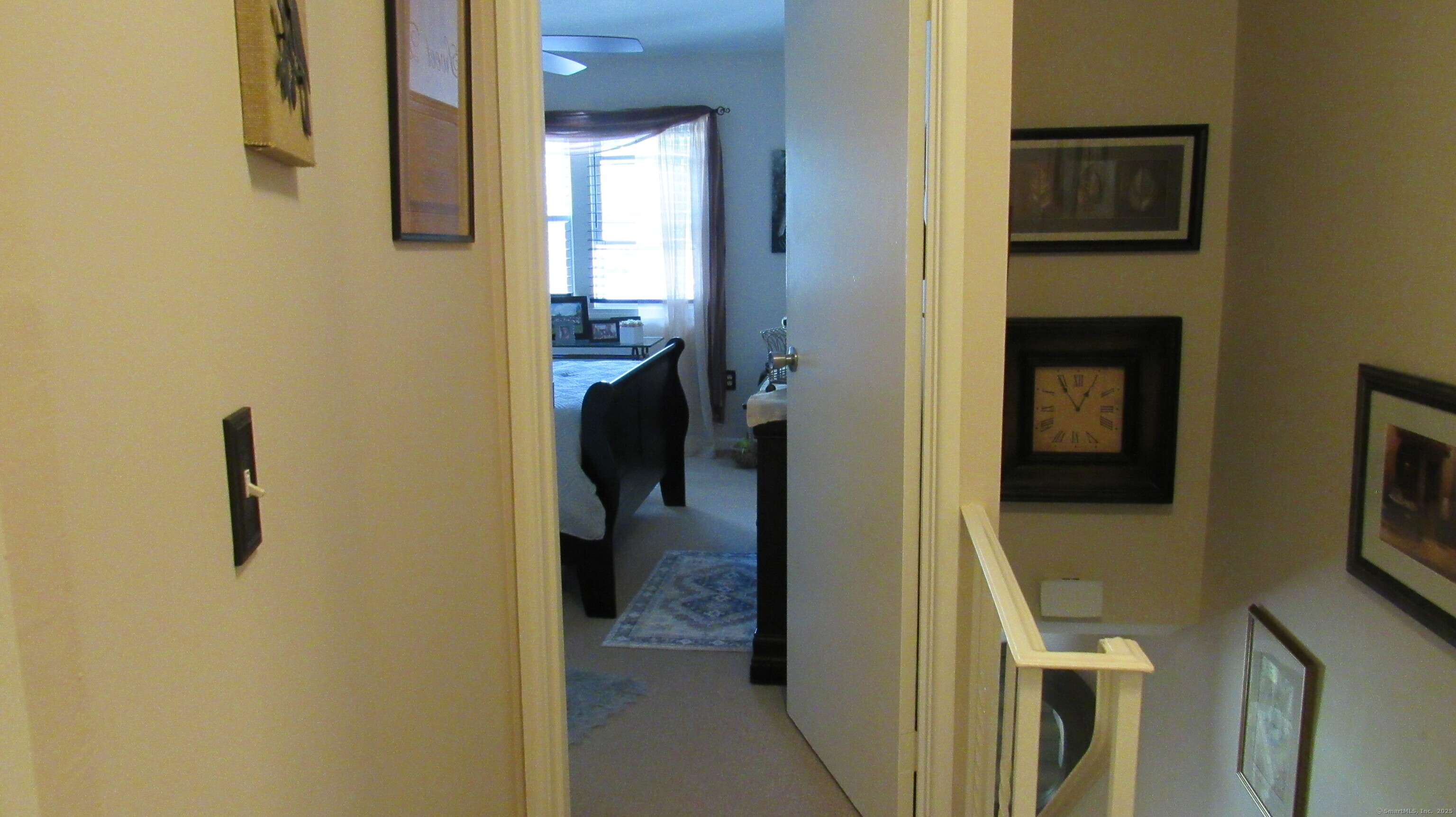 27 Surrey Lane, Unit 27 Torrington, CT 06790 - Photo 22 of 30 a view of a bedroom from a hallway