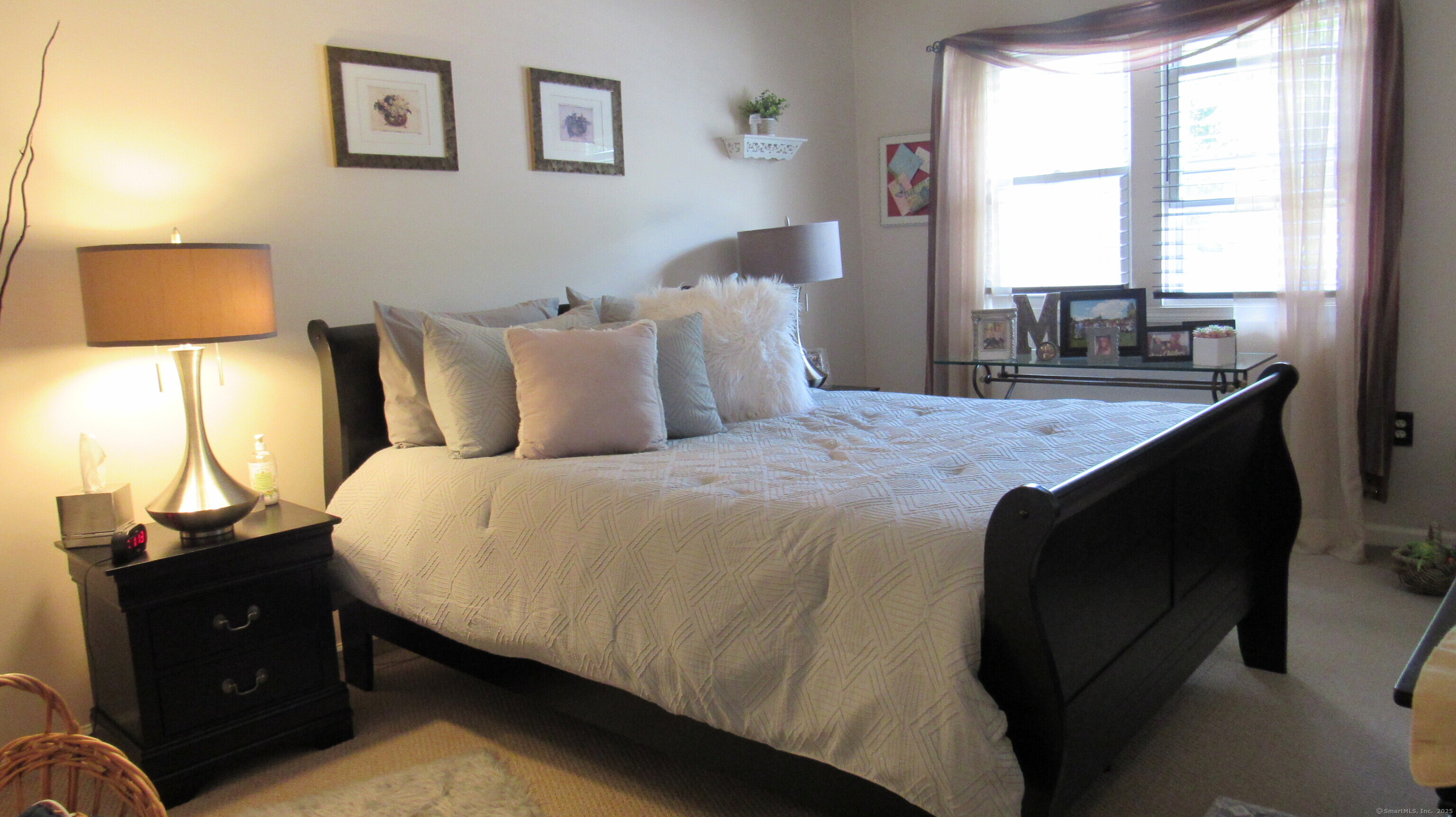 27 Surrey Lane, Unit 27 Torrington, CT 06790 - Photo 23 of 30 a bedroom with a bed and a window