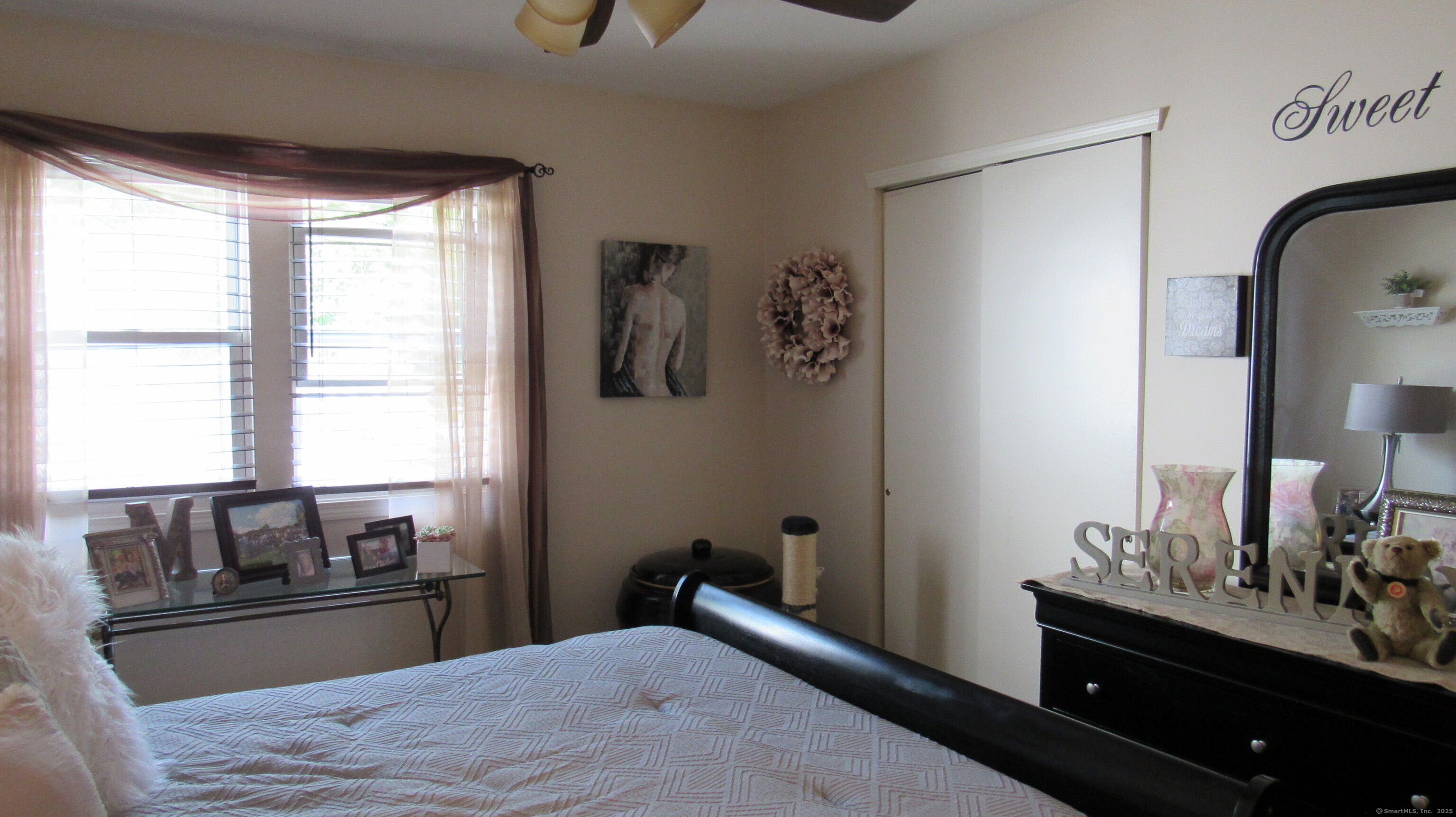 27 Surrey Lane, Unit 27 Torrington, CT 06790 - Photo 24 of 30 a bedroom with a bed and a dresser