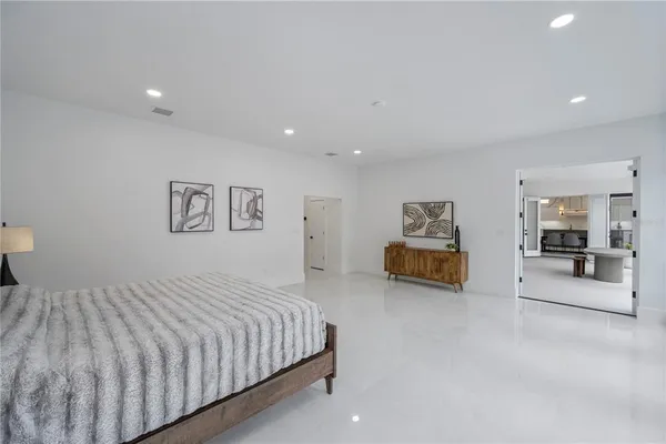 a spacious bathroom with a bathtub sink and toilet