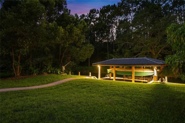 an aerial view of a house with a garden