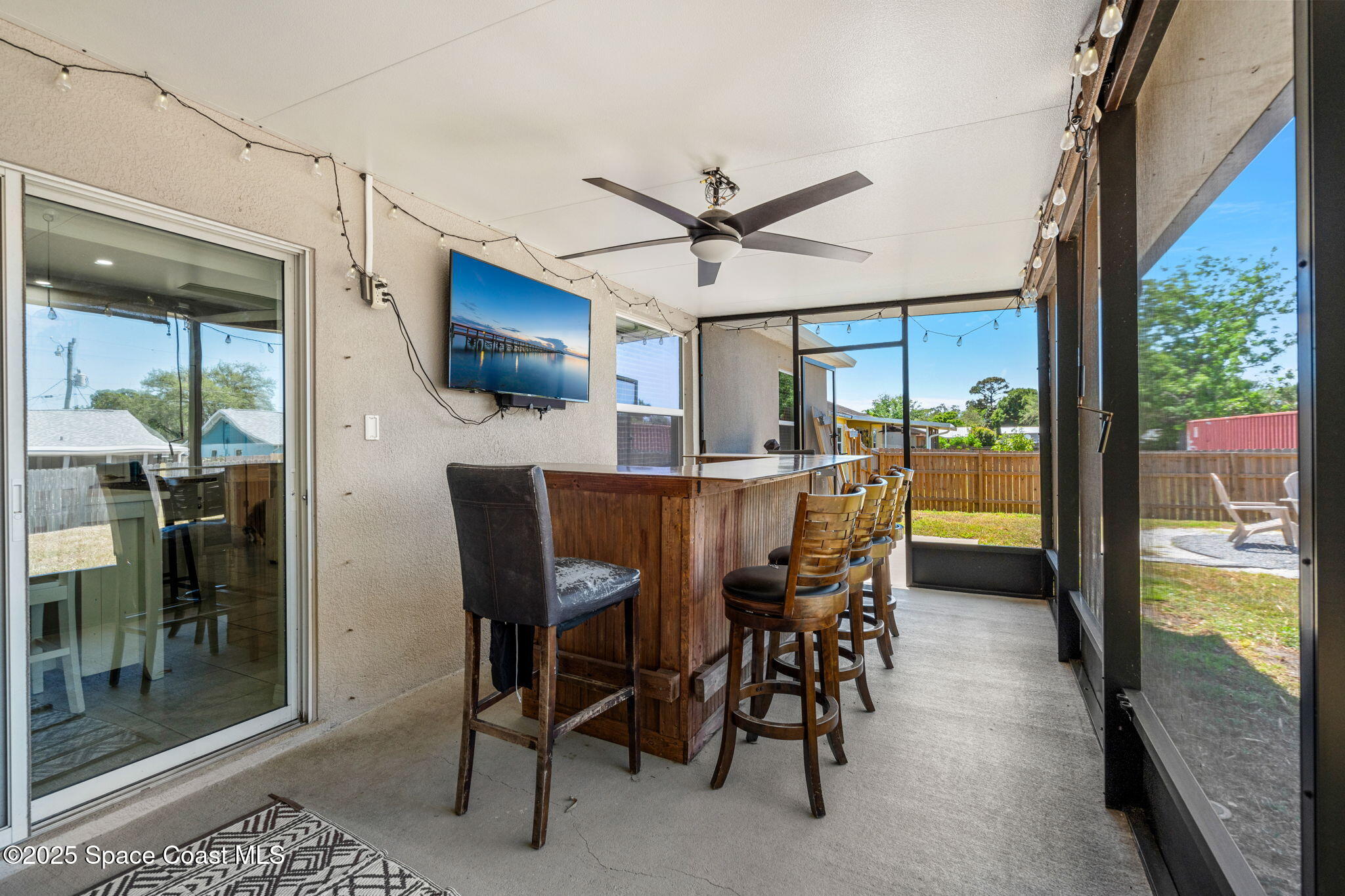 6162 Rena Avenue Cocoa, FL 32927 - Photo 24 of 42 a view of a dining room with furniture window and outside view
