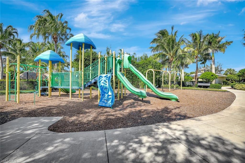 2193 Clementine Street Naples, FL 34120 - Photo 35 of 36 a view of a park with swings and slides