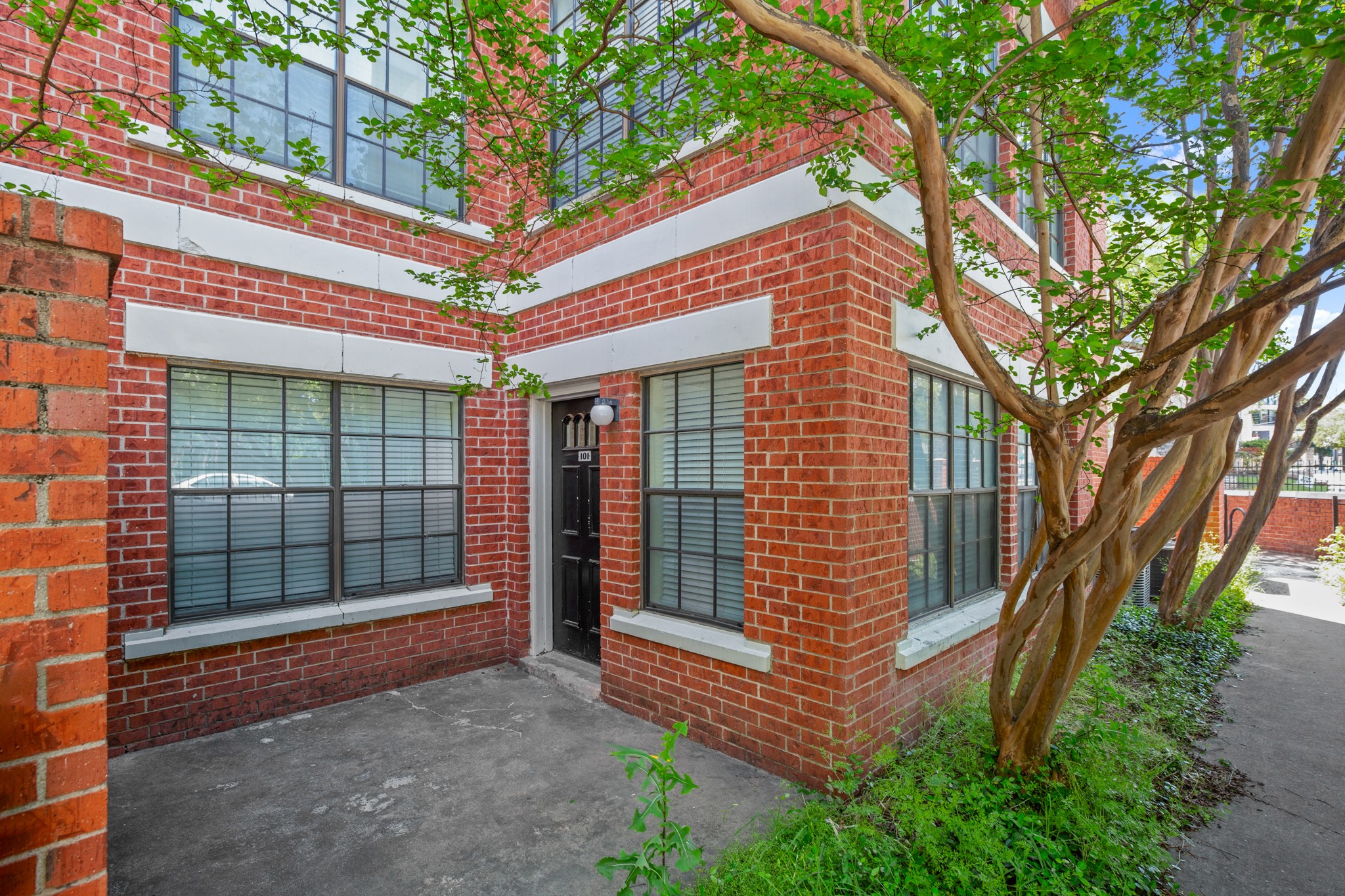 a front view of a house with a large windows