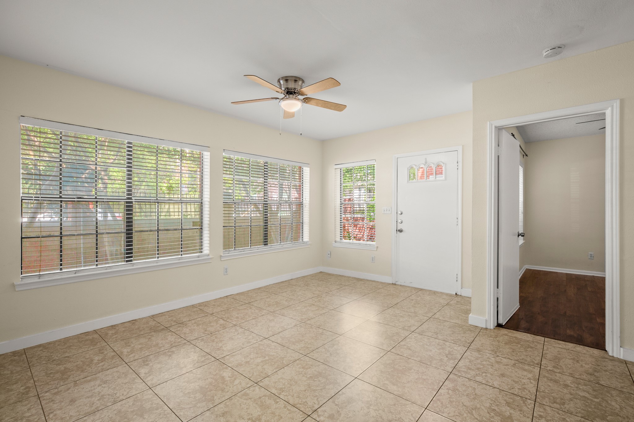 712 West 21st Street, Unit 101 Austin, TX 78705 - Photo 3 of 17 a view of an empty room with a window