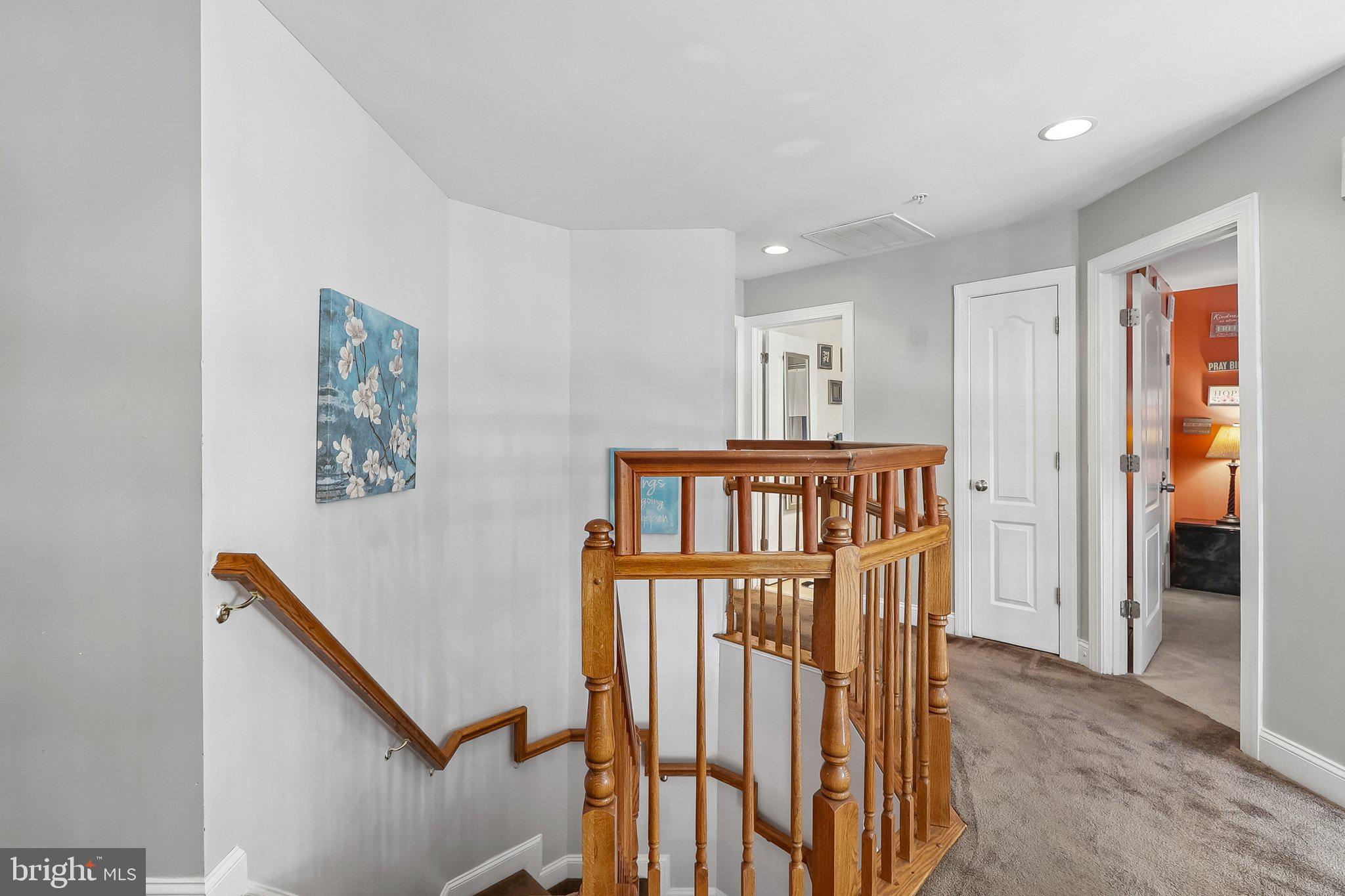 9003 Eldon Drive Clinton, MD 20735 - Photo 18 of 54 Inviting staircase with modern flair.