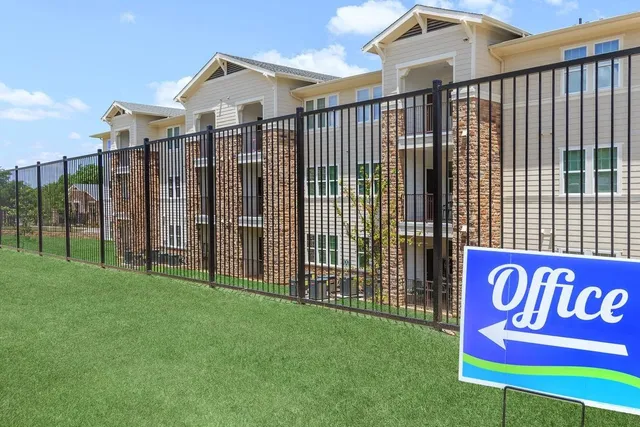 a view of a street sign of the house