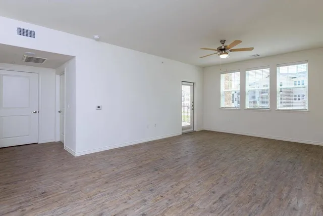 a view of a kitchen with a sink and a window