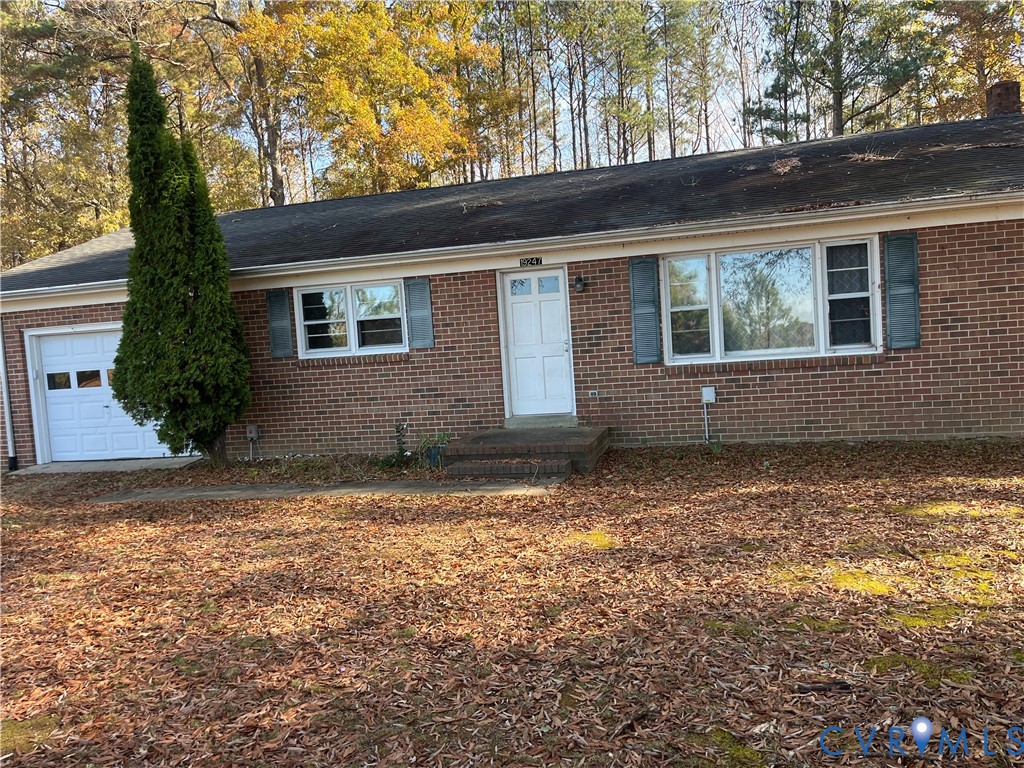 19247 Courthouse Road Yale, VA 23897 - Photo 1 of 6 Ranch-style house featuring brick siding and a gar