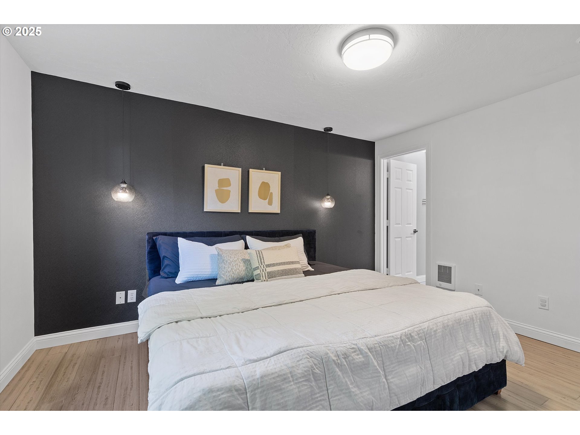 3635 Sea Mist Avenue Depoe Bay, OR 97341 - Photo 17 of 38 a bedroom with a bed and a night stand