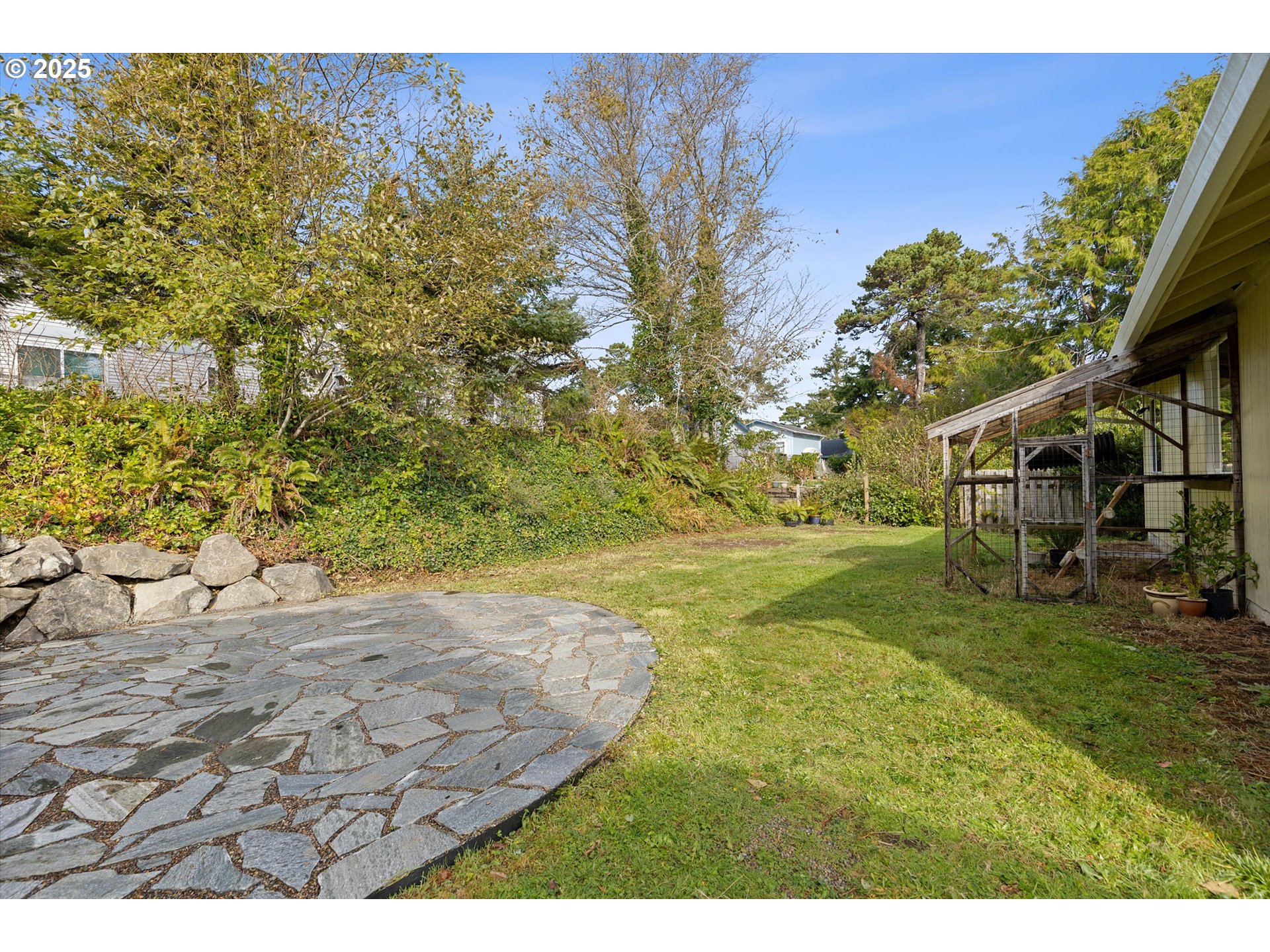 3635 Sea Mist Avenue Depoe Bay, OR 97341 - Photo 28 of 38 a view of outdoor space with garden