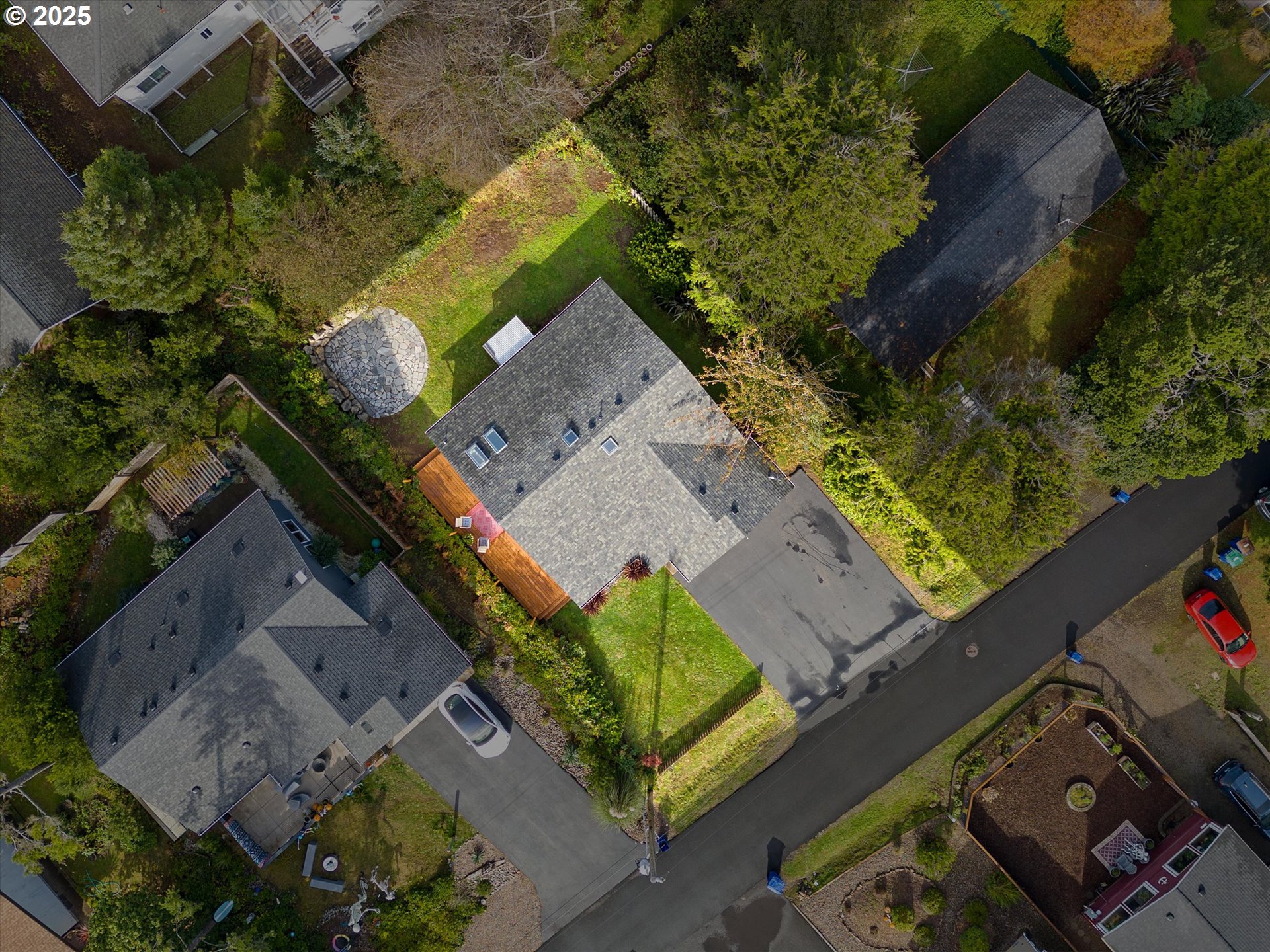 3635 Sea Mist Avenue Depoe Bay, OR 97341 - Photo 37 of 38 an aerial view of a house with a yard