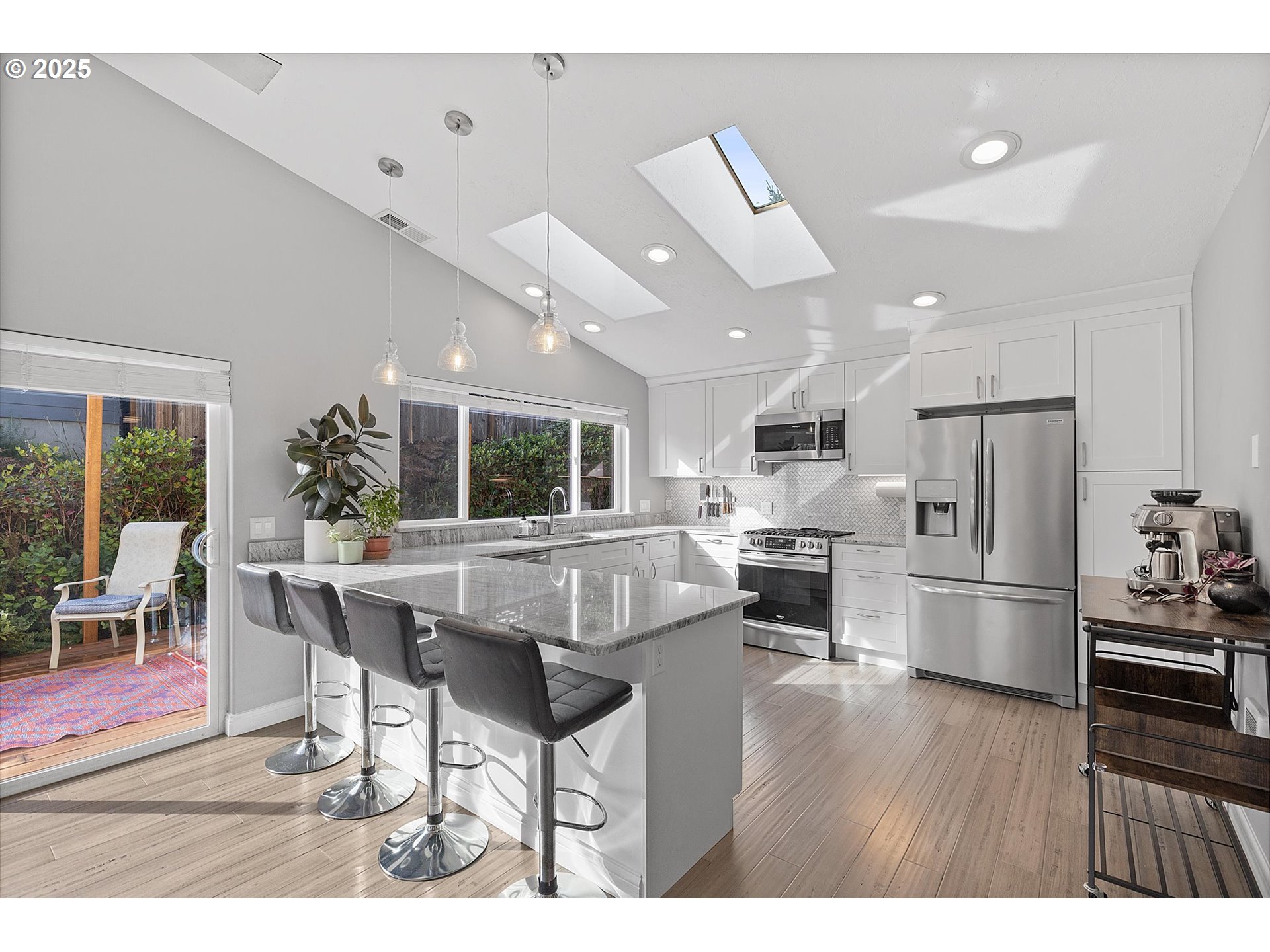 3635 Sea Mist Avenue Depoe Bay, OR 97341 - Photo 10 of 38 a dining hall with stainless steel appliances kitchen island granite countertop a dining table chairs and granite counter tops