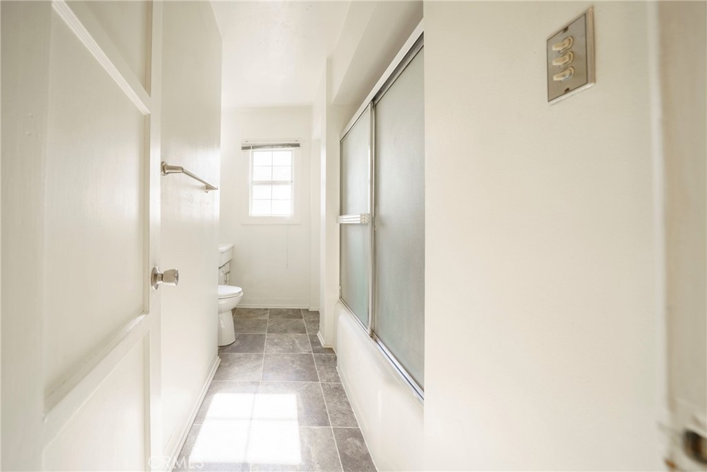 5446 Columbus Avenue Sherman Oaks, CA 91411 - Photo 18 of 31 a bathroom with a sink and a toilet