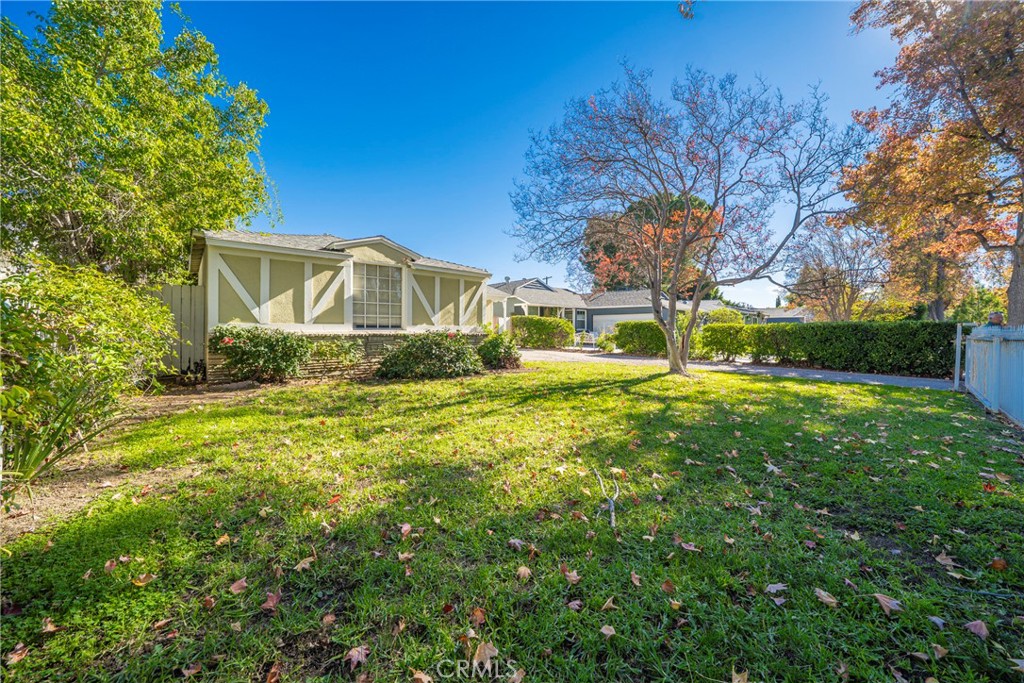 5446 Columbus Avenue Sherman Oaks, CA 91411 - Photo 6 of 31 a front view of a house with garden