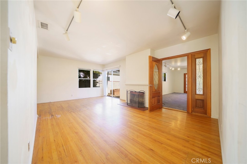 5446 Columbus Avenue Sherman Oaks, CA 91411 - Photo 10 of 31 a view of a livingroom with wooden floor