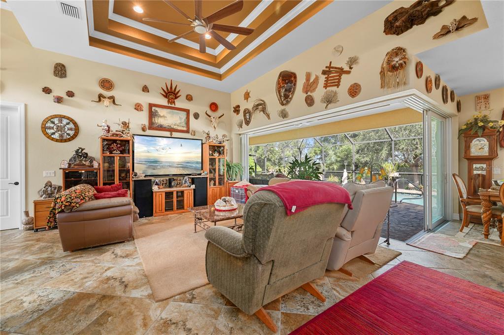 38881 Washington Loop Road Punta Gorda, FL 33982 - Photo 19 of 63 a living room with furniture and a large window