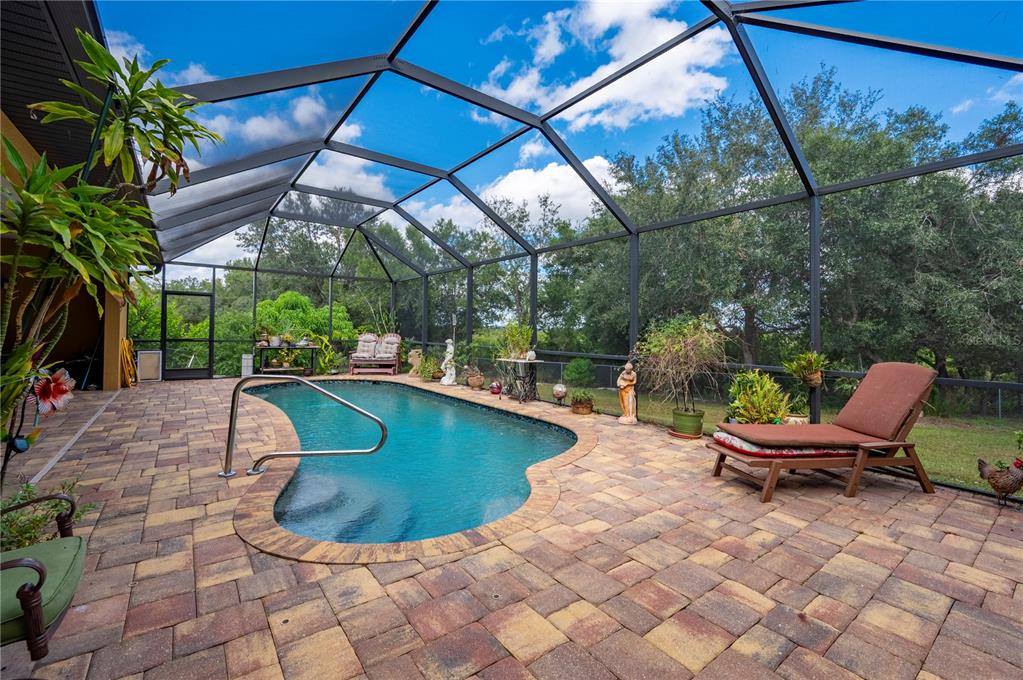 38881 Washington Loop Road Punta Gorda, FL 33982 - Photo 38 of 63 a view of a backyard with sitting area