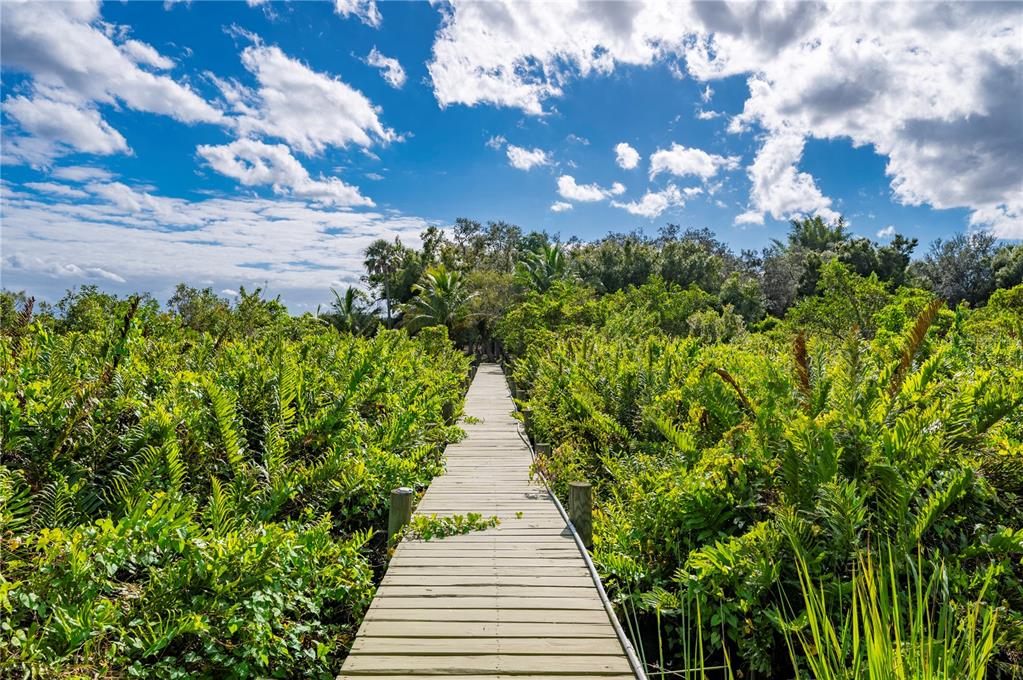 38881 Washington Loop Road Punta Gorda, FL 33982 - Photo 53 of 63 a view of a pathway with flower plants