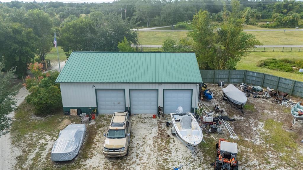 38881 Washington Loop Road Punta Gorda, FL 33982 - Photo 57 of 63 a aerial view of a house with yard and furniture