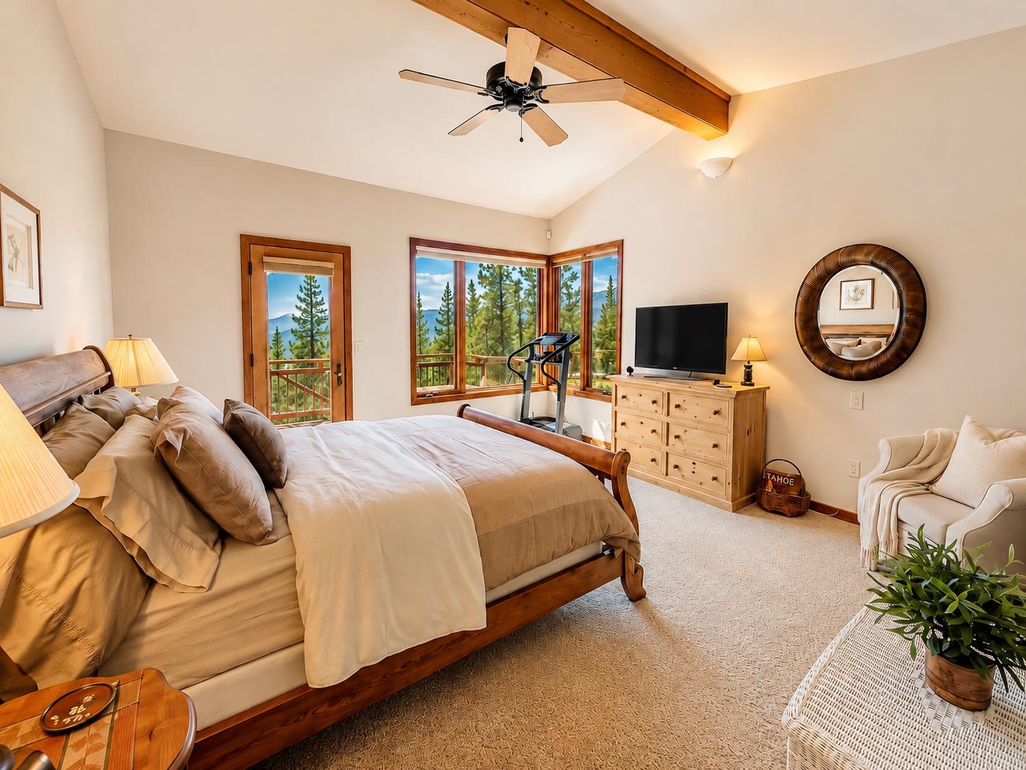 238 Clouds Rest Portola, CA 96122 - Photo 20 of 34 a spacious bedroom with a bed and a flat tv screen on dresser