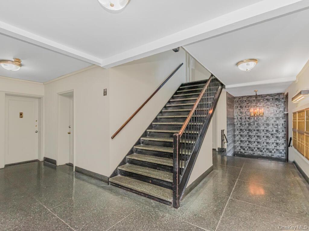 800 Bronx River Road, Unit A12 Bronxville, NY 10708 - Photo 3 of 14 a view of an empty room with stairs and stairs