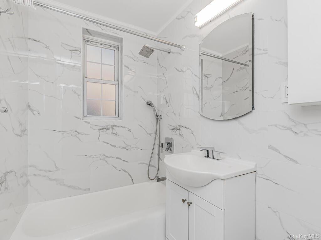 800 Bronx River Road, Unit A12 Bronxville, NY 10708 - Photo 8 of 14 a bathroom with a sink and a shower