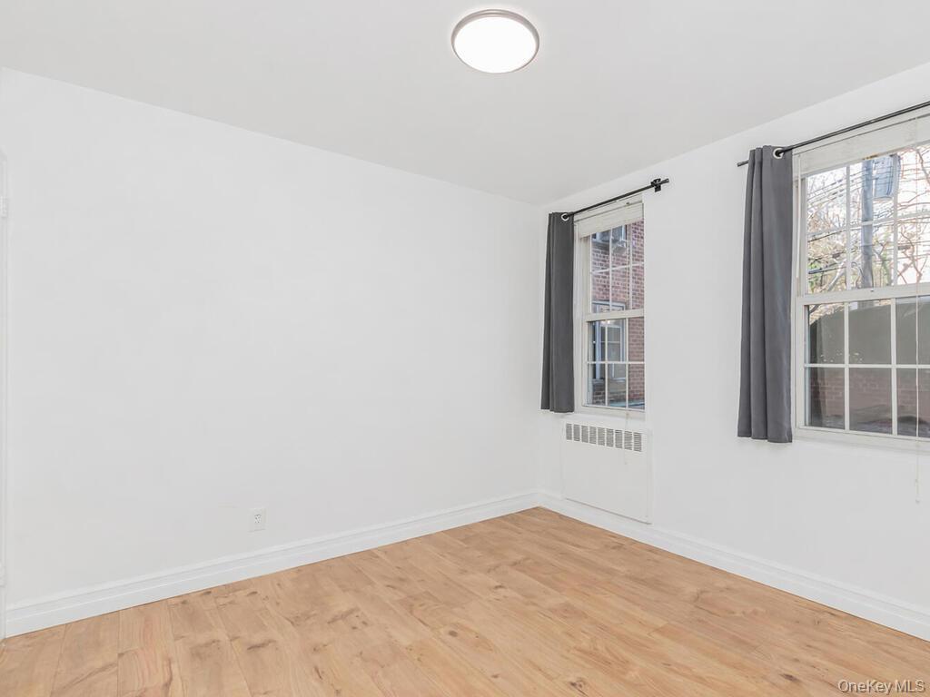 800 Bronx River Road, Unit A12 Bronxville, NY 10708 - Photo 9 of 14 an empty room with windows