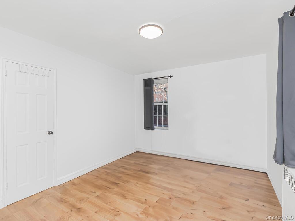 800 Bronx River Road, Unit A12 Bronxville, NY 10708 - Photo 10 of 14 a view of empty room with wooden floor