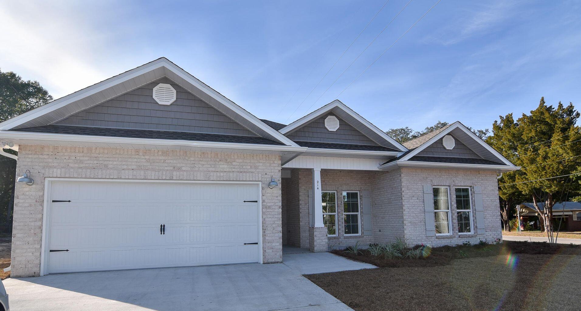 669 Red Fern Road Crestview, FL 32536 - Photo 1 of 1 a front view of a house with a yard