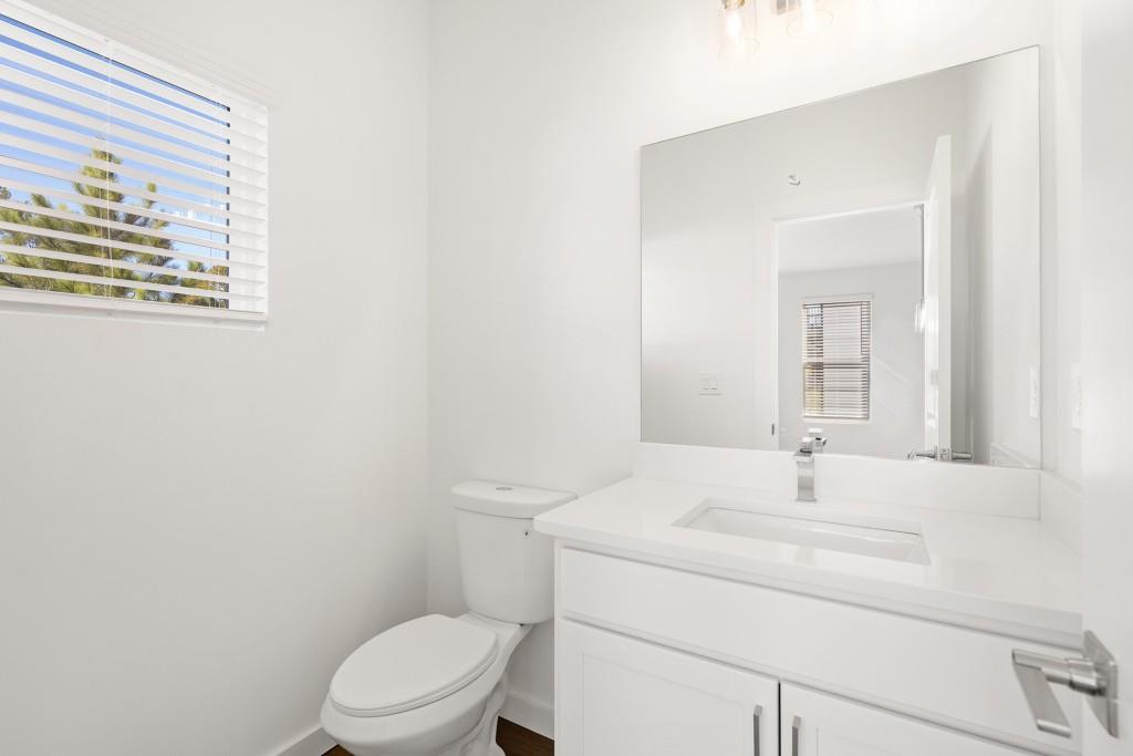 1078 Glen Opal Drive Decatur, GA 30032 - Photo 25 of 40 a bathroom with a sink toilet and mirror