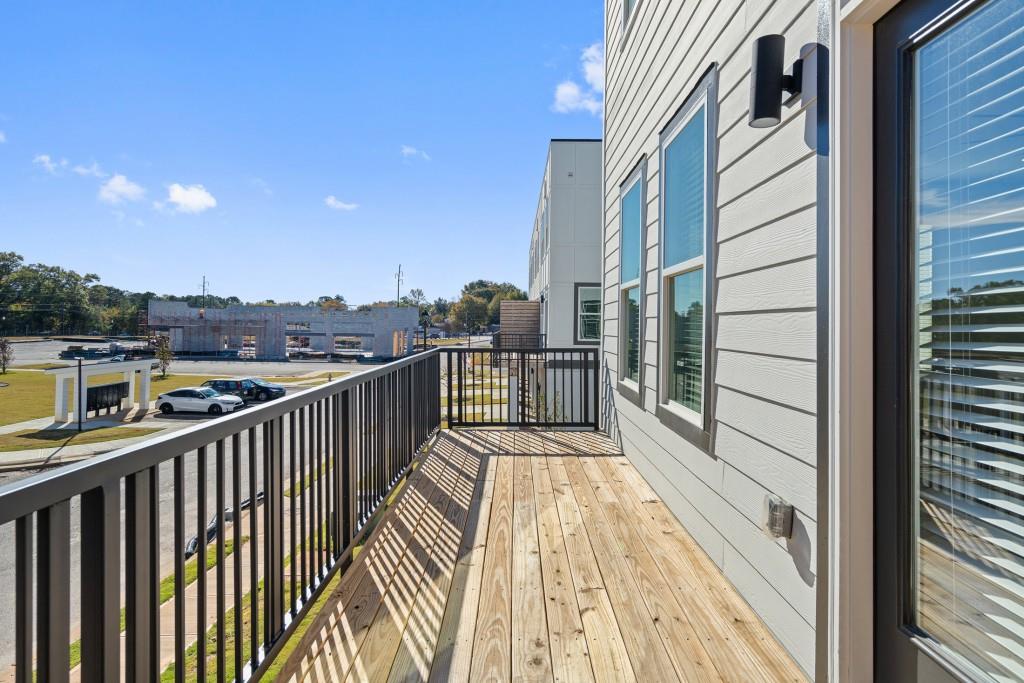 1078 Glen Opal Drive Decatur, GA 30032 - Photo 26 of 40 a view of a balcony with wooden floor and fence