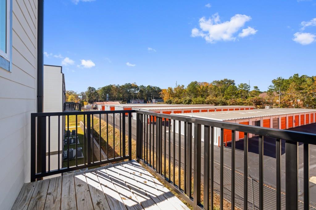 1078 Glen Opal Drive Decatur, GA 30032 - Photo 35 of 40 a view of a balcony with wooden floor