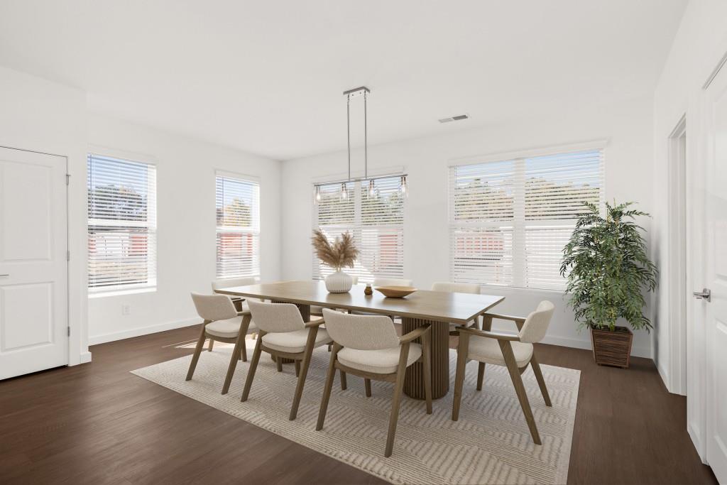 1078 Glen Opal Drive Decatur, GA 30032 - Photo 5 of 40 a view of a dining room with furniture and wooden floor