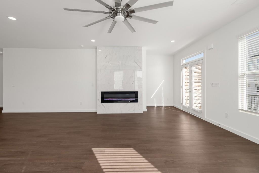 1078 Glen Opal Drive Decatur, GA 30032 - Photo 9 of 40 a view of an empty room with window and wooden floor
