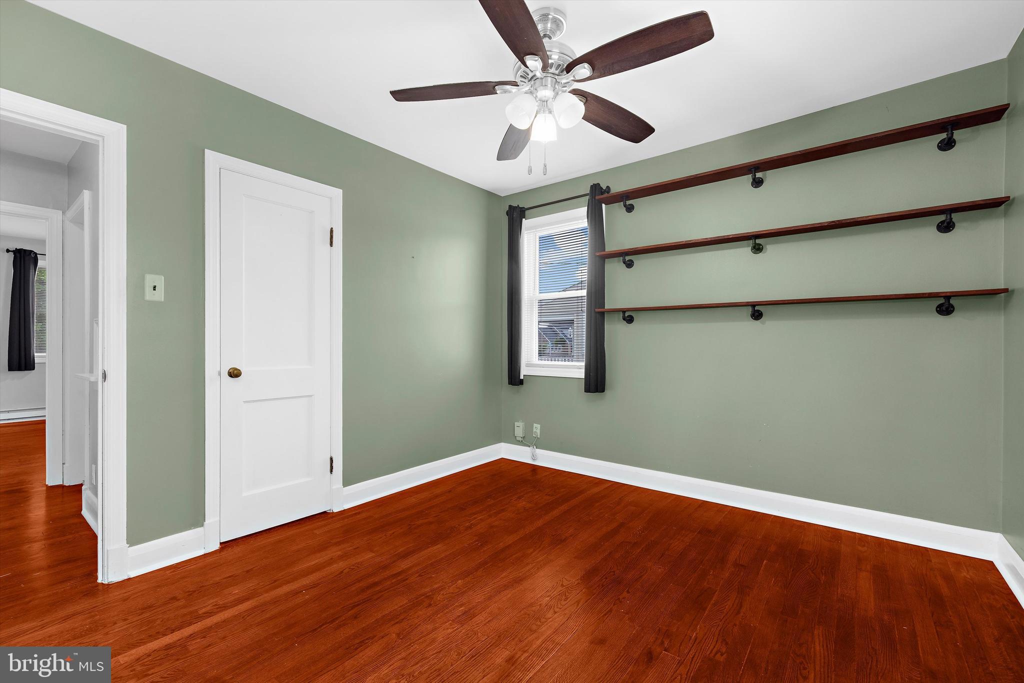 8464 Geneva Road Pasadena, MD 21122 - Photo 15 of 59 wooden floor in an empty room