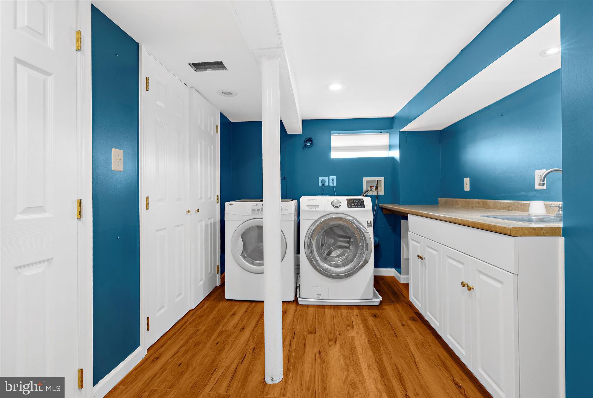 8464 Geneva Road Pasadena, MD 21122 - Photo 20 of 59 a utility room with dryer and washer