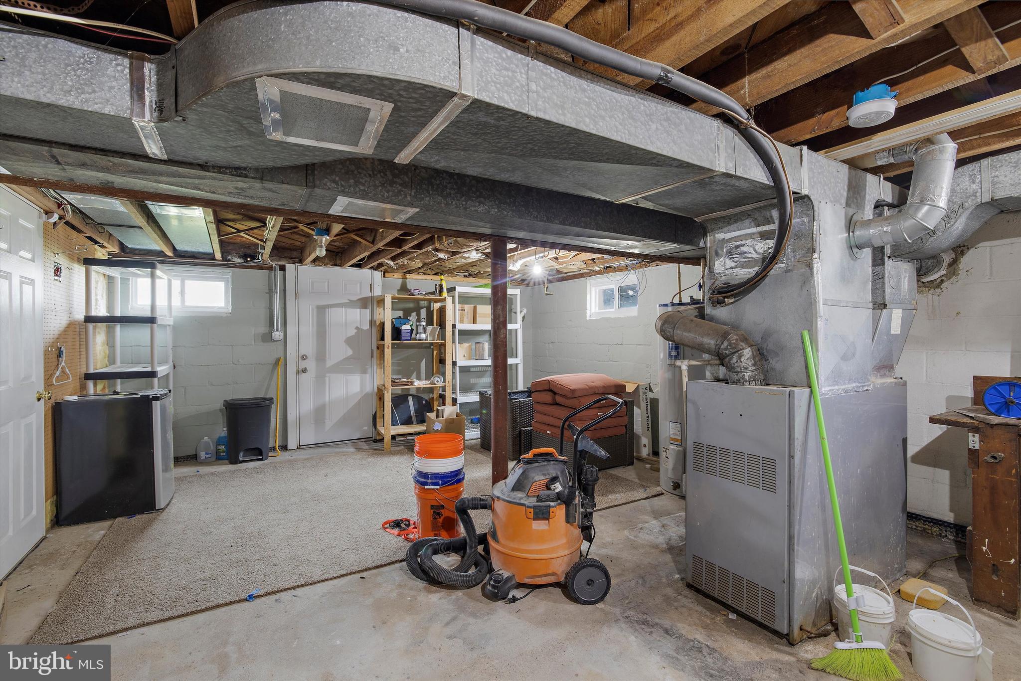 8464 Geneva Road Pasadena, MD 21122 - Photo 33 of 59 a view of storage and utility room