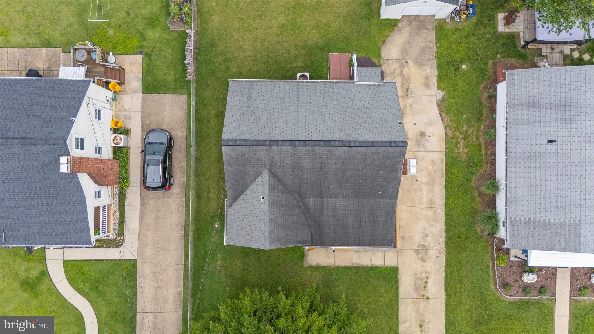 8464 Geneva Road Pasadena, MD 21122 - Photo 41 of 59 an aerial view of residential houses with outdoor space and swimming pool