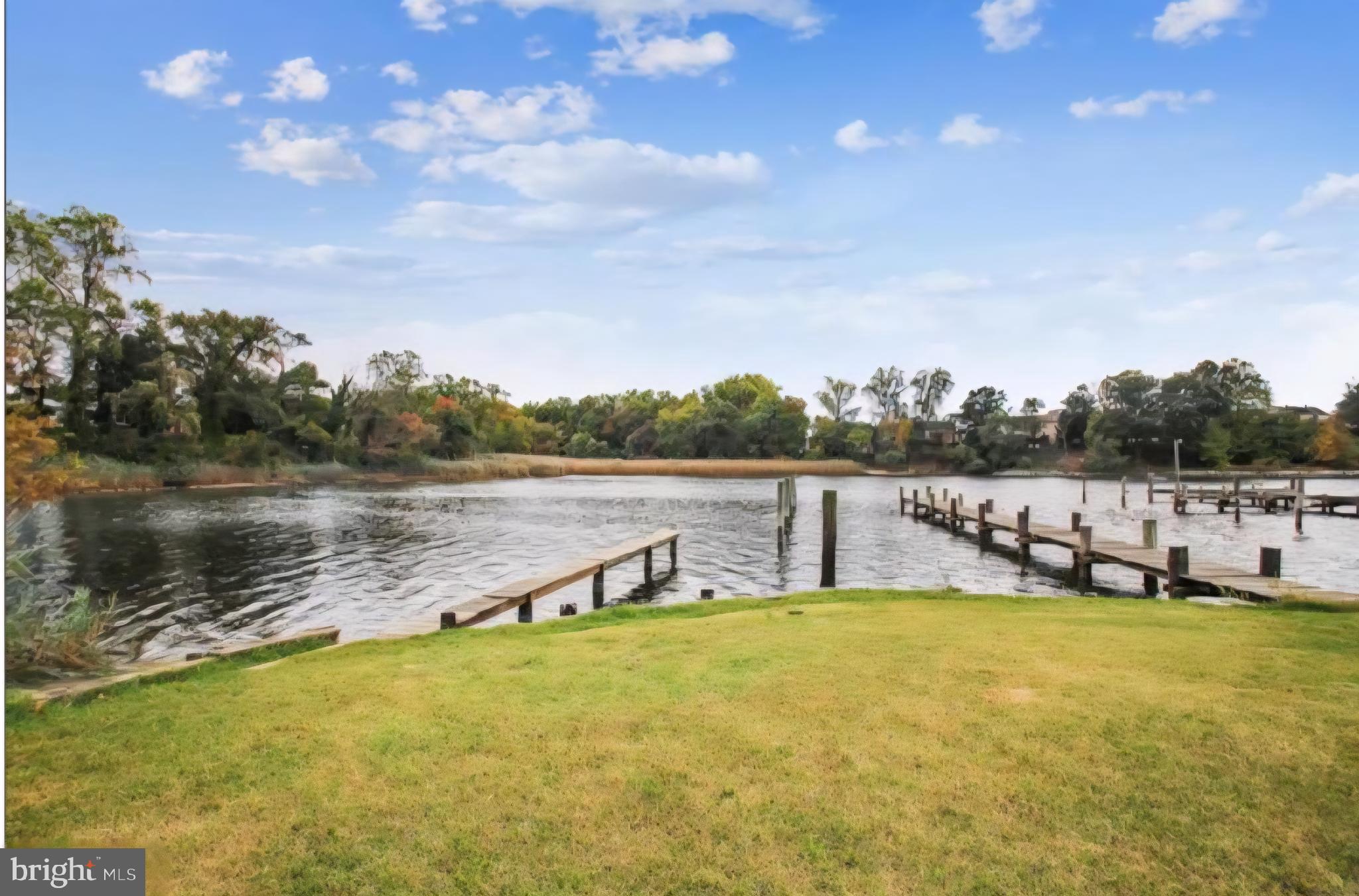 8464 Geneva Road Pasadena, MD 21122 - Photo 52 of 59 a view of a lake with outdoor space