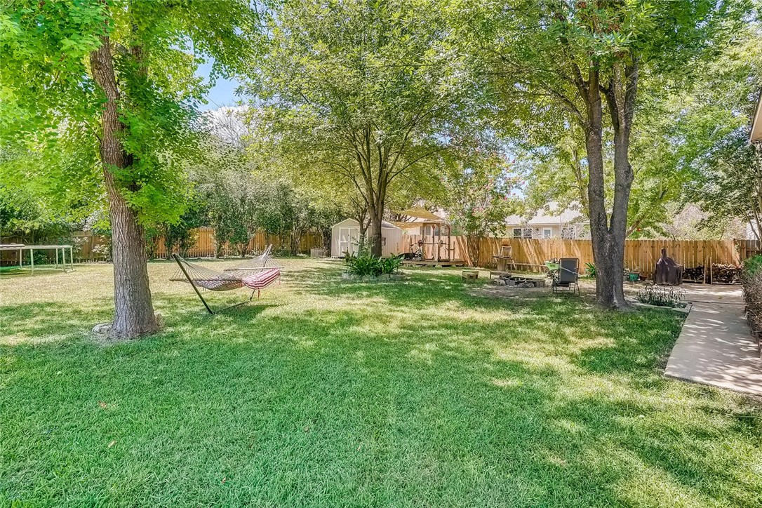 607 Runners Ridge Pflugerville, TX 78660 - Photo 1 of 1 a view of backyard with green space