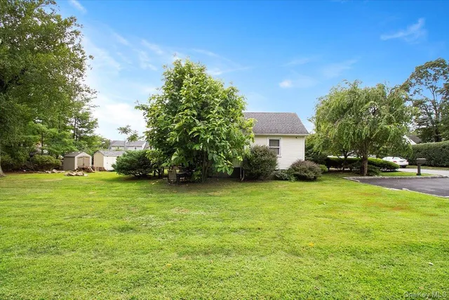 a house view with a garden space