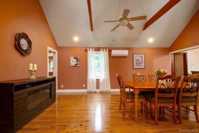 a view of a dining room with furniture