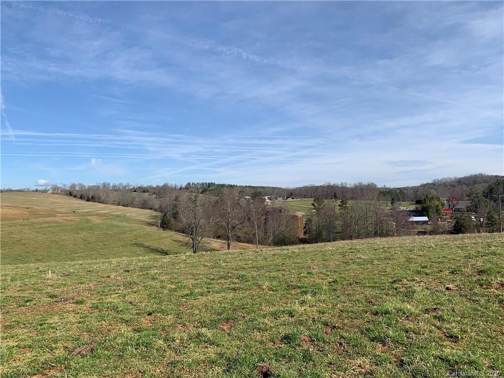 0 North Tom Camp Road North, Unit 4 Rutherfordton, NC 28139 - Photo 1 of 13 a view of an ocean beach and mountain
